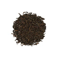 Loose leaf Earl Grey black tea with finely rolled dark tea leaves, ready for brewing into commercial tea bases.