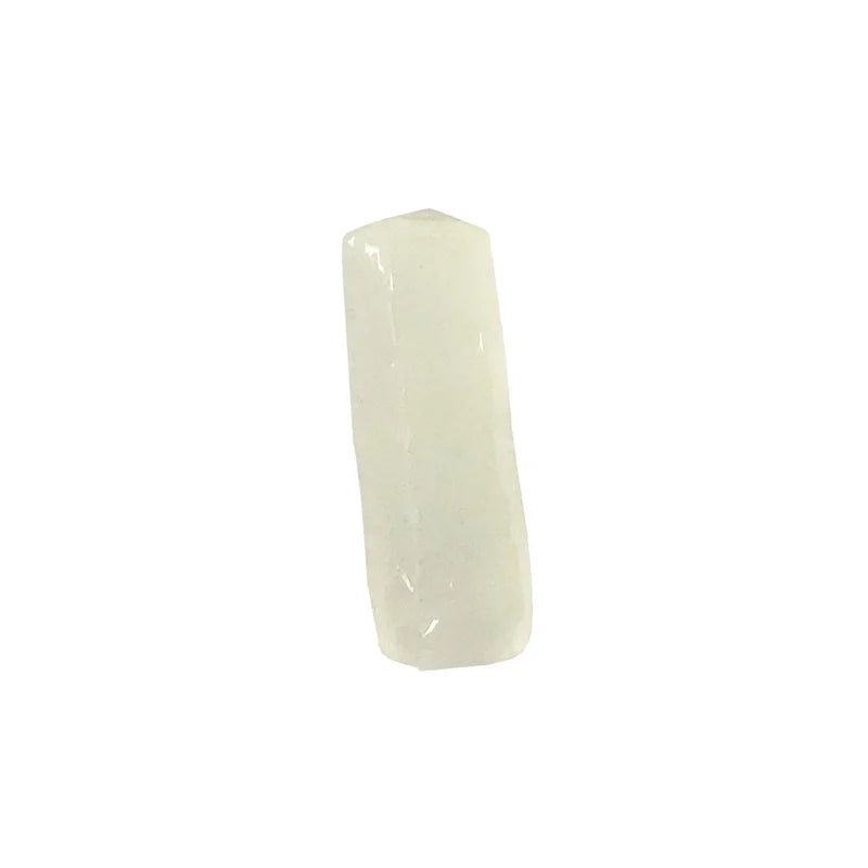 Close-up of lychee coconut jelly strip, featuring a translucent white color and crunchy, chewy texture.