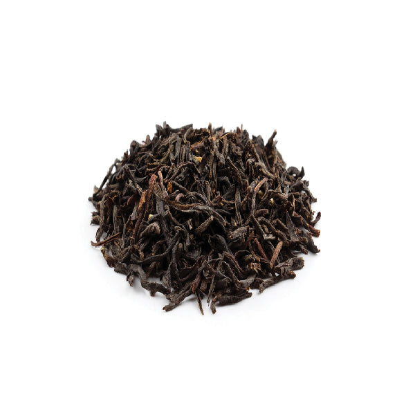Heavily roasted dark Tie Guan Yin oolong tea leaves for espresso extraction.